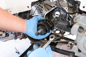 Close-up view of an ATV repair in progress